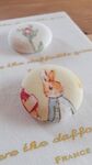 boutons en tissu Peter rabbit, rose